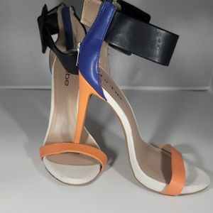 Orange and black bebe stiletto sandal size 7